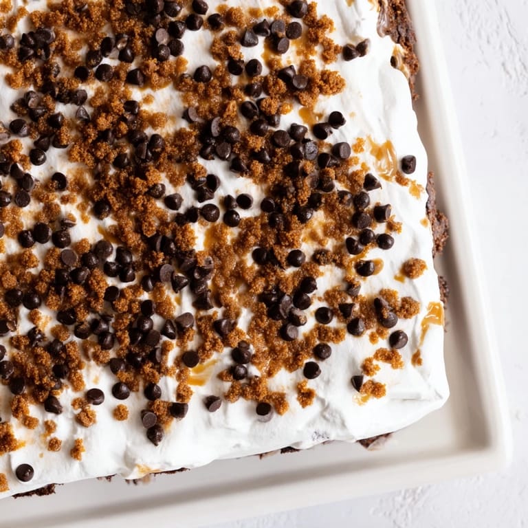 This decadent Better Than Sex Cake is soaked in caramel with a luscious whipped topping.